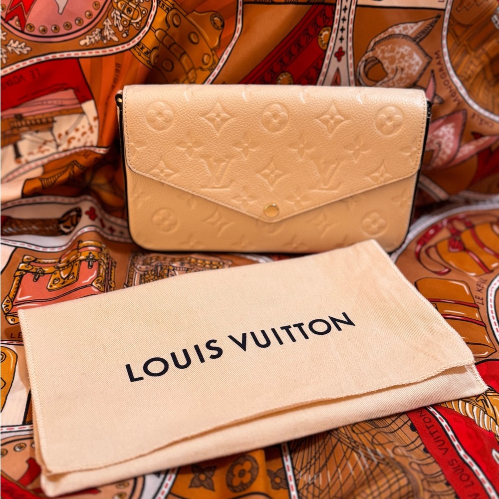 Louis Vuitton Cream Clutch with Embossed Monogram